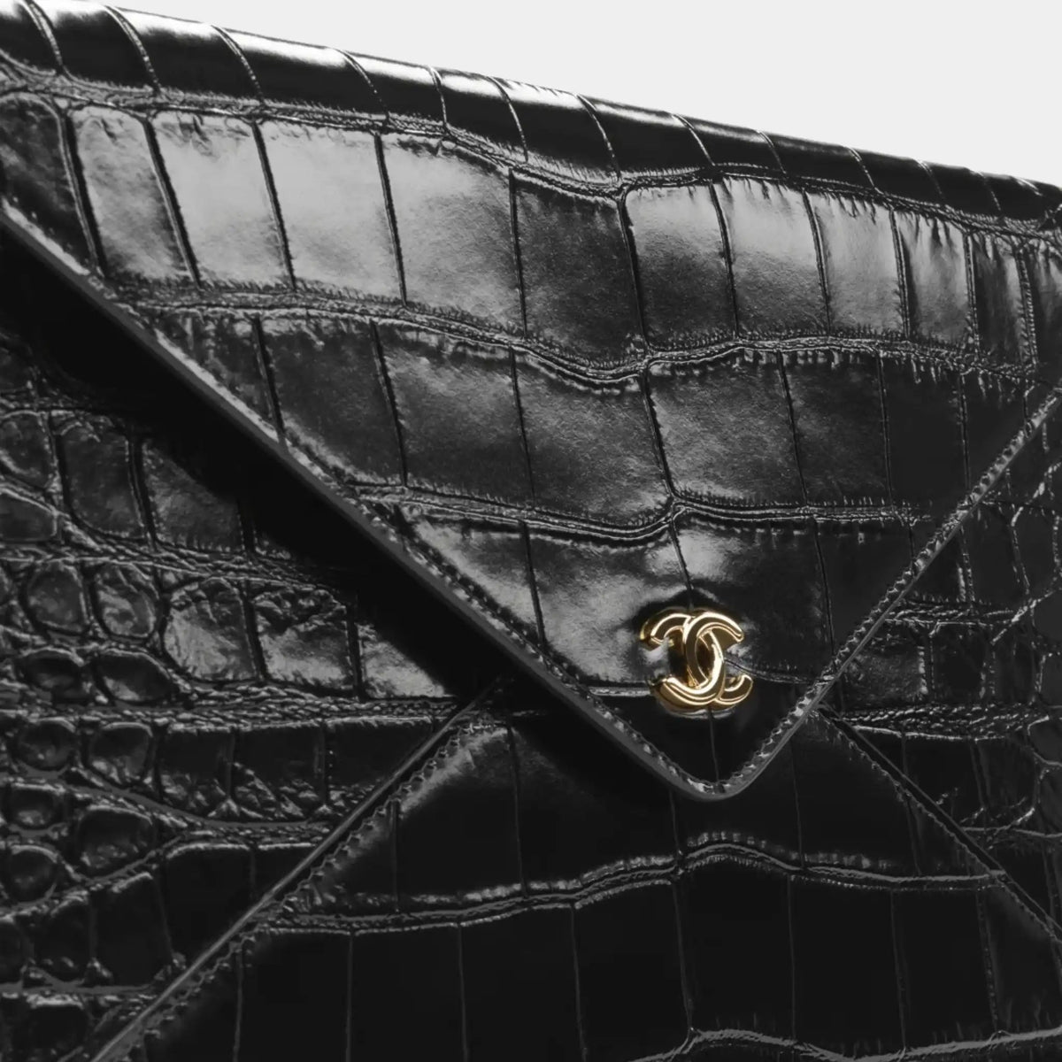 Clutch with Chain in Crocodile Embossed Calfskin & Gold-Tone Metal